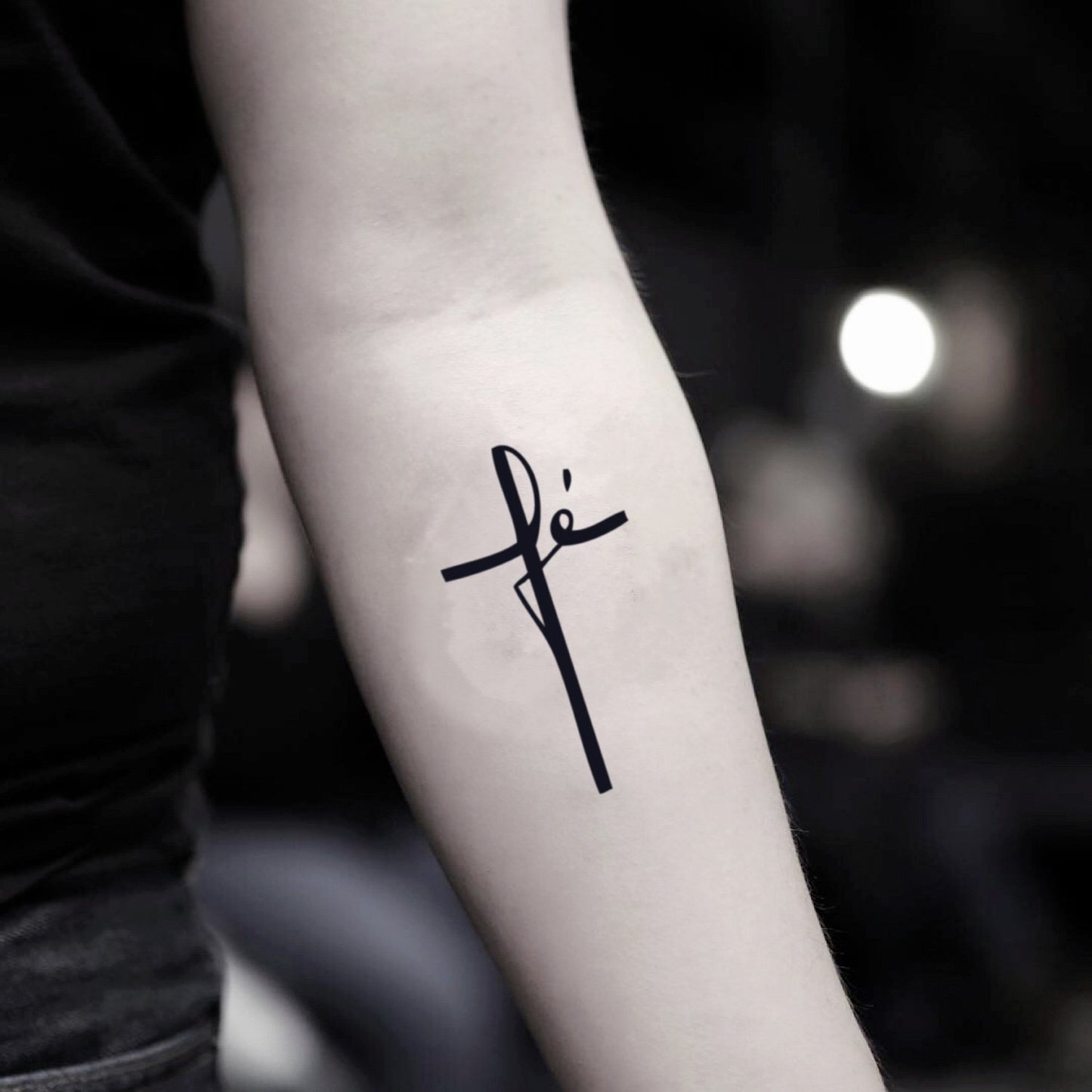 fake small fe cross minimalist temporary tattoo sticker design idea on inner arm