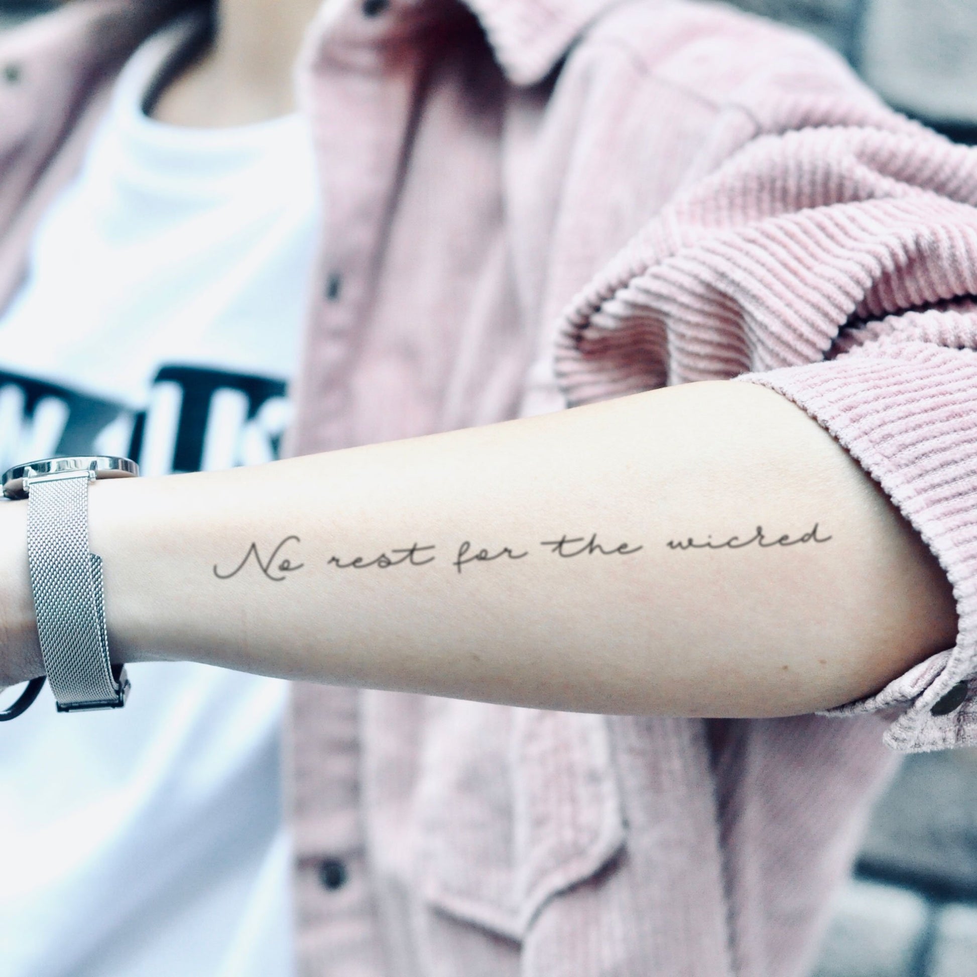 fake medium no rest for the wicked ways lettering temporary tattoo sticker design idea on forearm