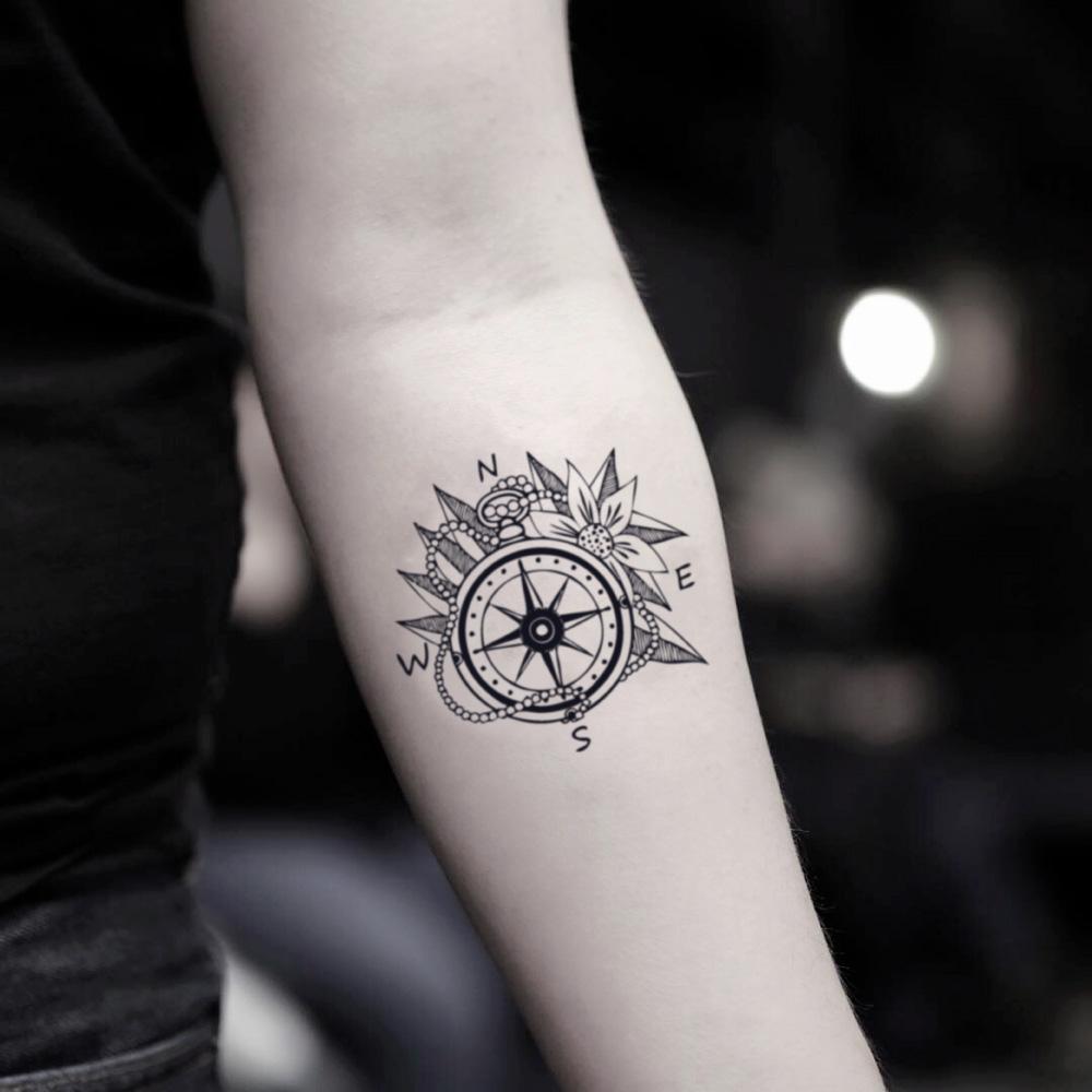 fake small compass rose flower world travel illustrative temporary tattoo sticker design idea on inner arm