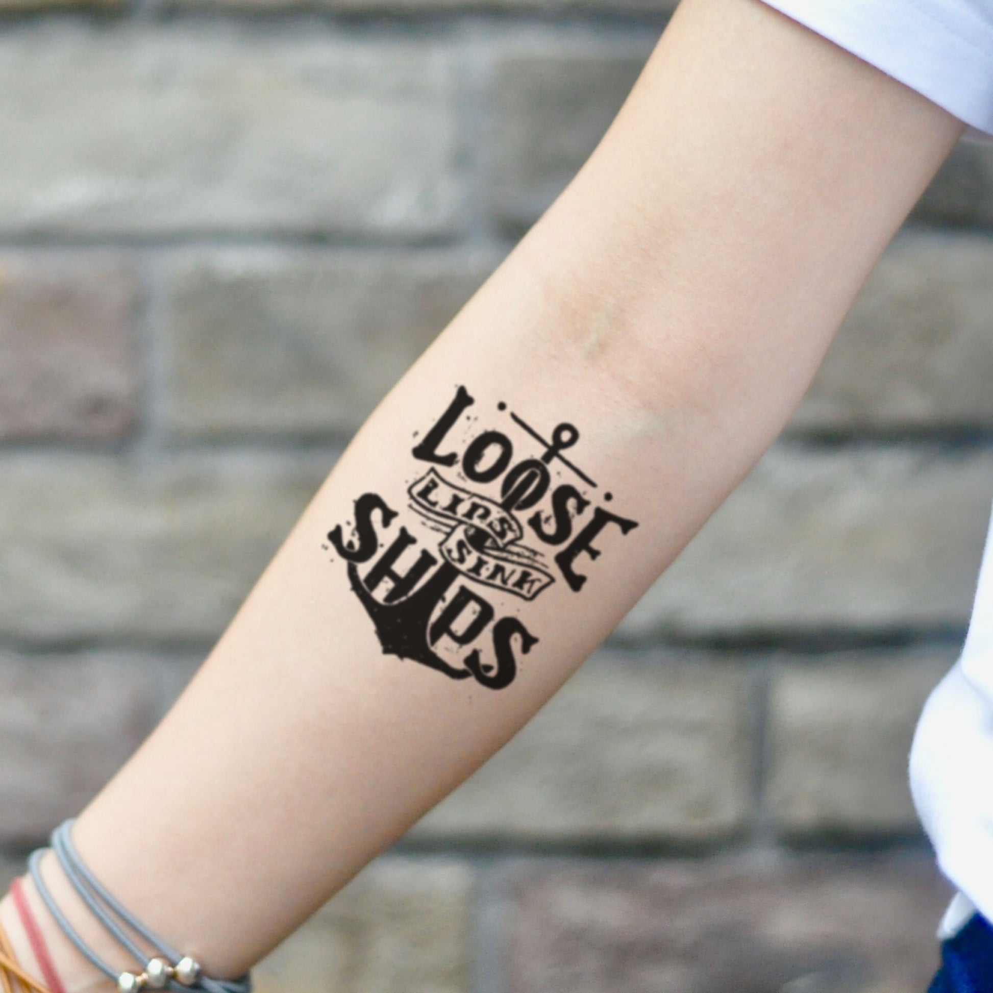 fake small loose lips sink ships illustrative temporary tattoo sticker design idea on inner amr