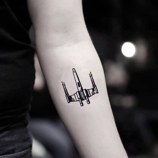 fake small x wing illustrative temporary tattoo sticker design idea on inner arm